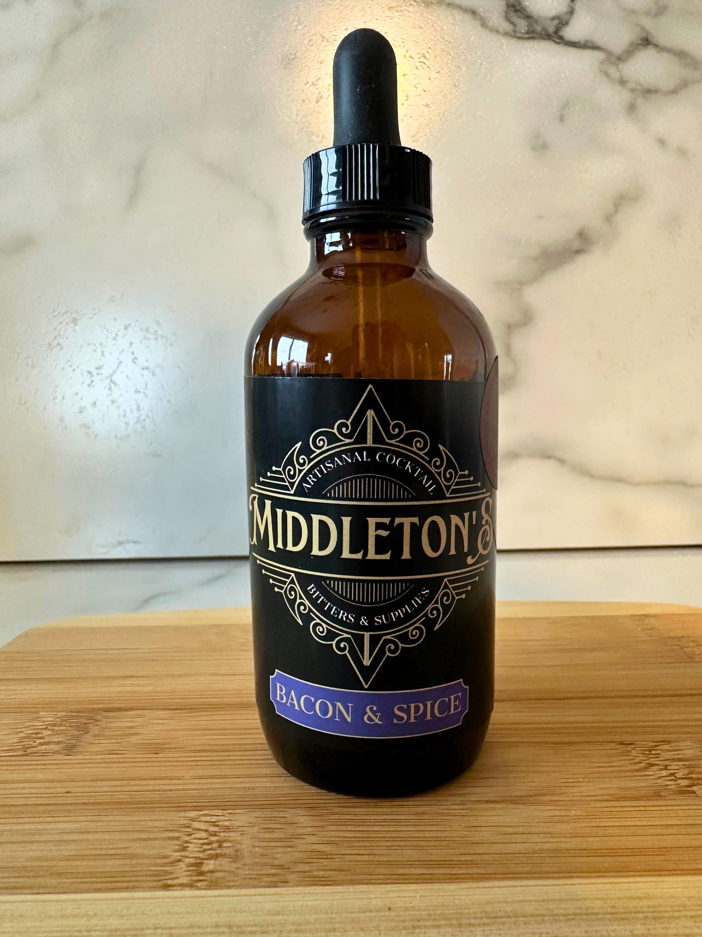 4oz bottle of Middleton's Bacon & Spice Bitters with smoky bacon flavor