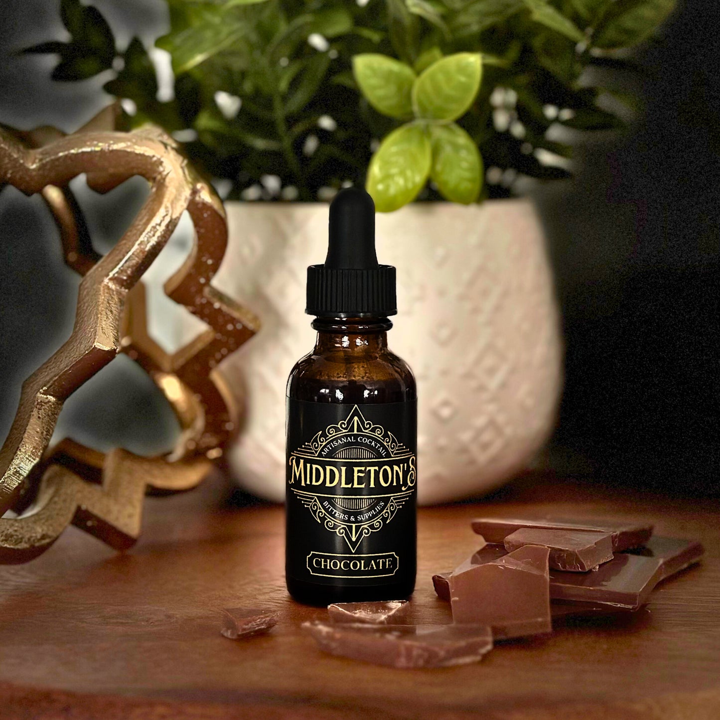Bottle of Middleton's Chocolate Bitters with dark liquid and handcrafted label